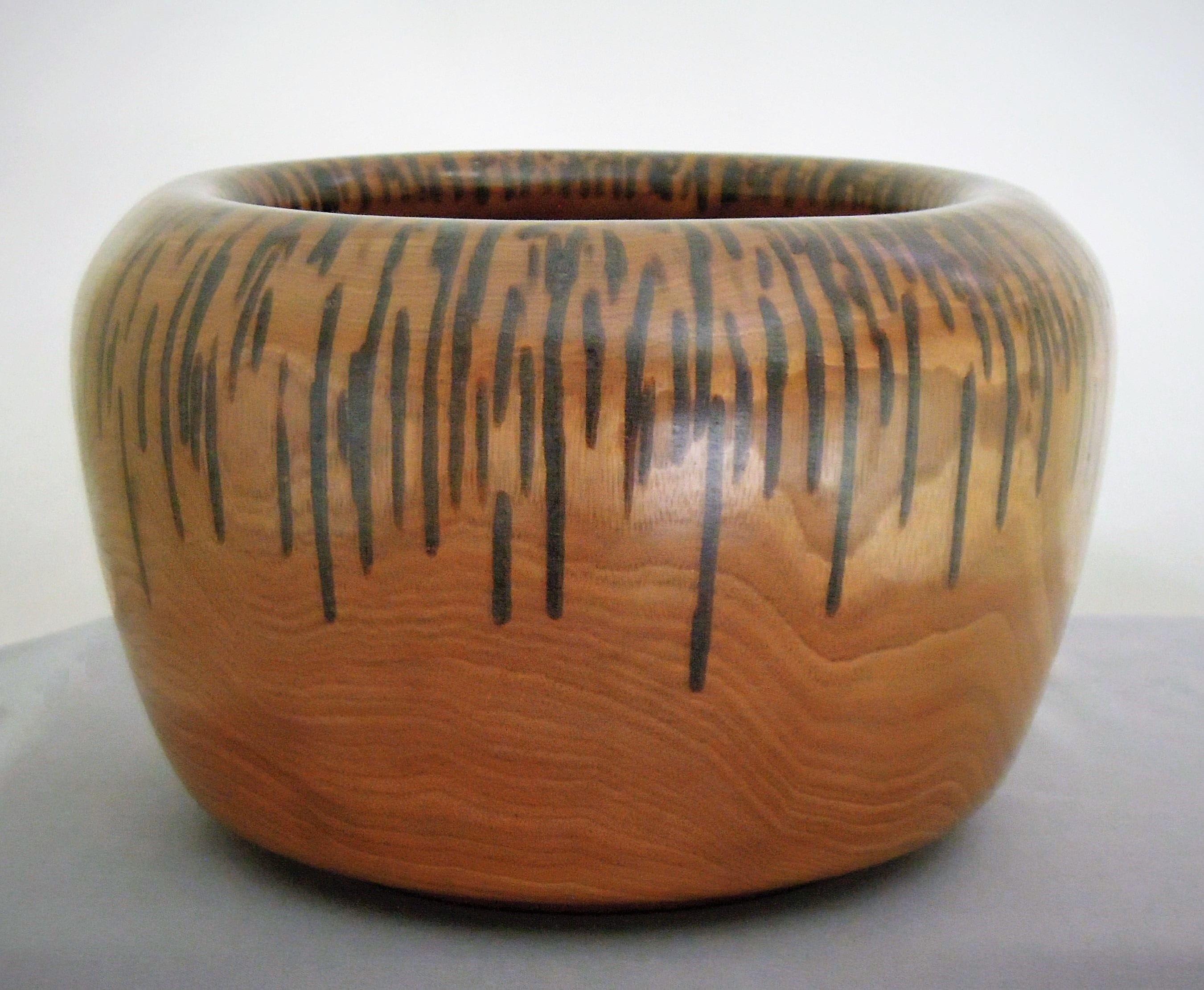 Made of Black Walnut
5.5"H X 8.5Dia.
Signed and #144