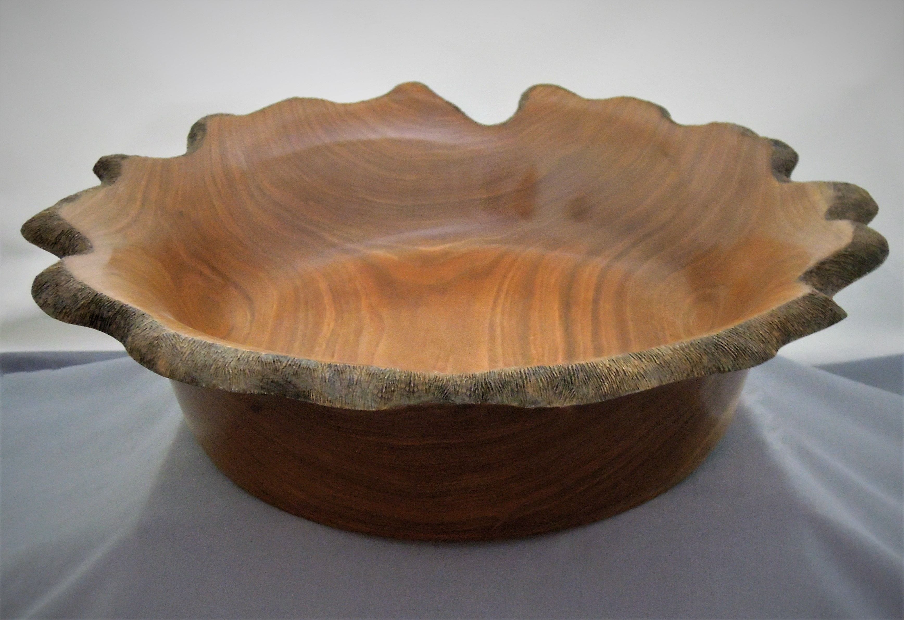 Made of English Walnut
5"H X 17"Dia
Signed and #48